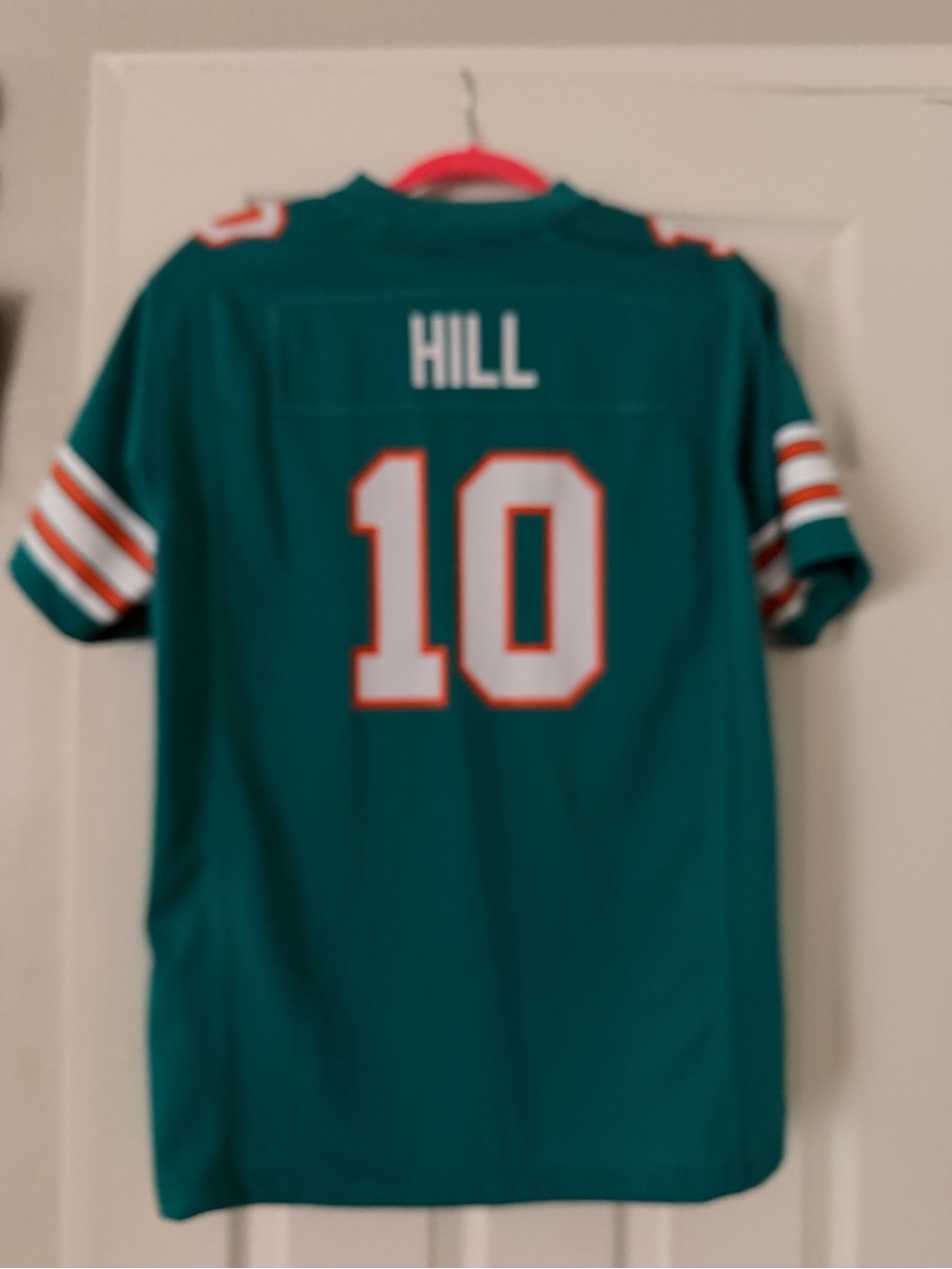 NFL Teal 'Hill' #10 Kids Football Jersey with White and Orange Accents